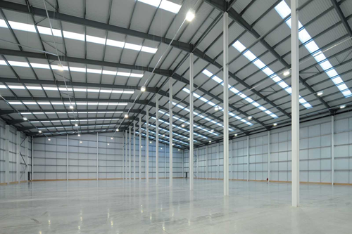 Industrial shed fabrication with durable steel structures for factories and warehouses
